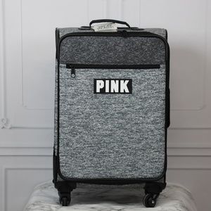 on vacay luggage pink